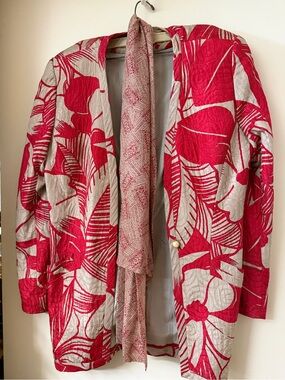Red Floral Quilted Jacket with Neutral Background